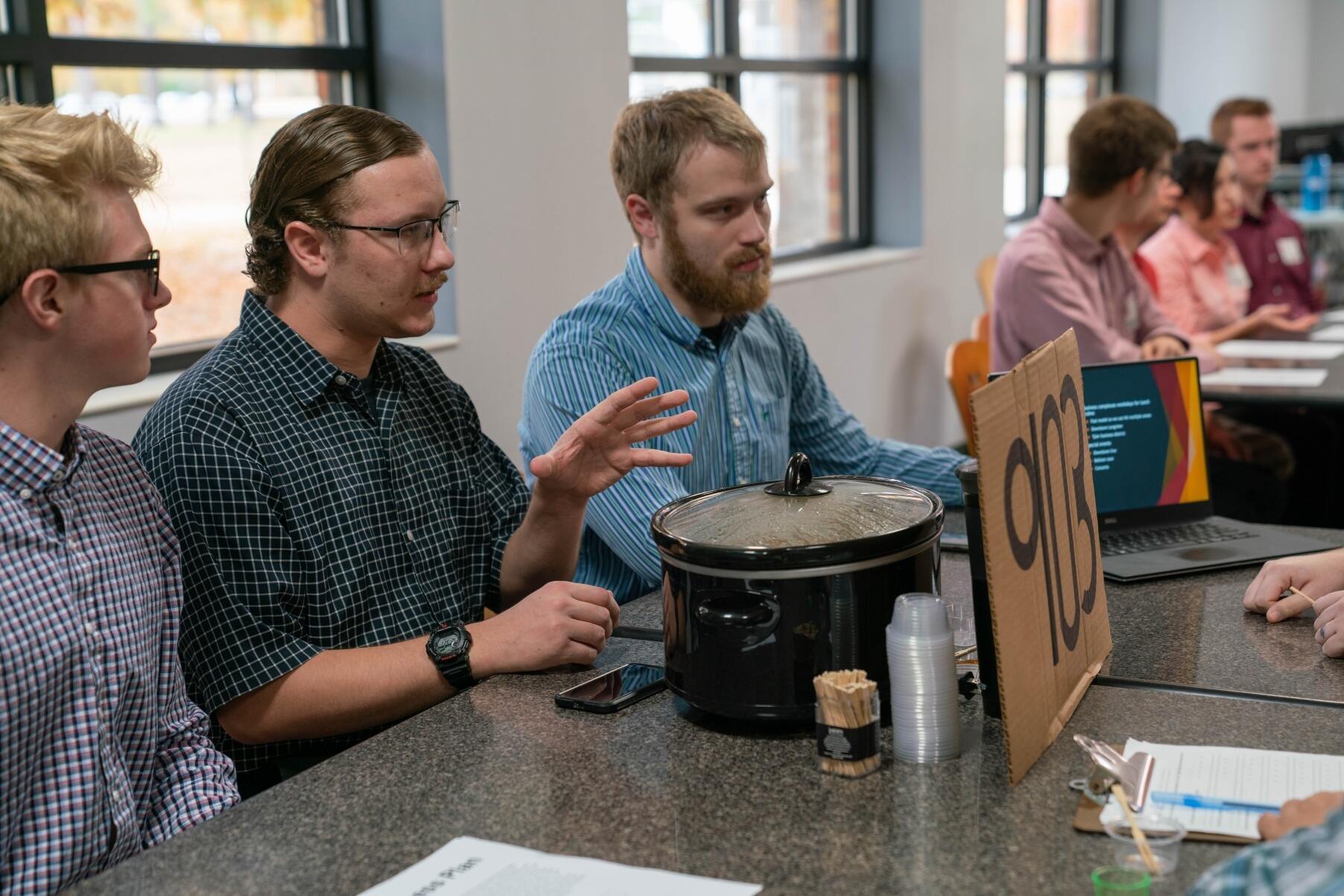 Students present business plan to community members